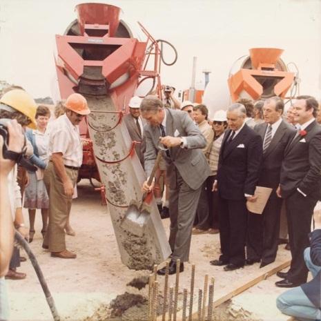 Untitled (Prime Minister Malcolm Fraser with shovel and the pouring of cement at Parliament House construction site), Parliament House Art Collection, Canberra ACT, No. 06/0082.015